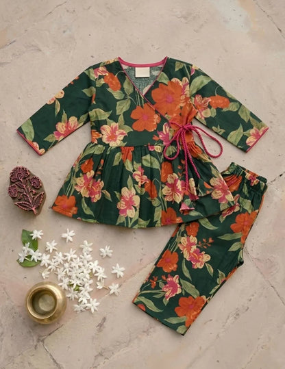 stylish girls green floral outfit front view peplum top and pants set