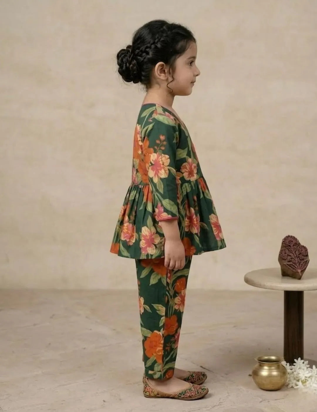 side view of girls green floral co-ord set wrap top and pants