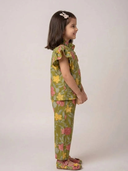 Side view of girls green floral cotton co-ord set with flutter sleeves