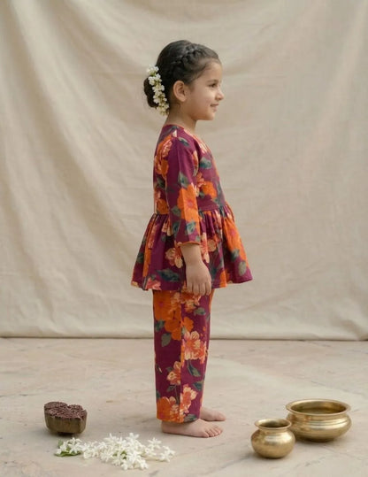 side view of girls maroon floral co-ord set wrap style outfit