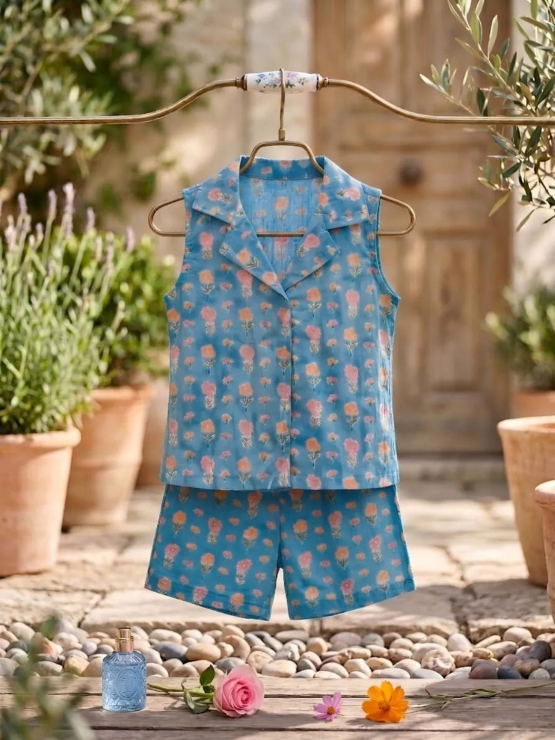 Kids blue floral cotton top and shorts co-ord set front angle