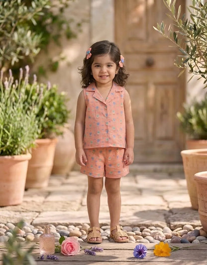 Girls pastel floral sleeveless co-ord set in peach front view