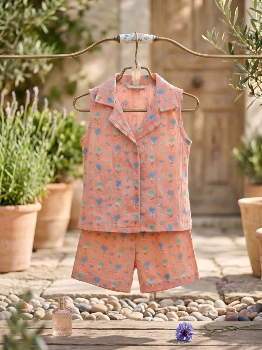 Kids peach floral cotton top and shorts co-ord set front angle