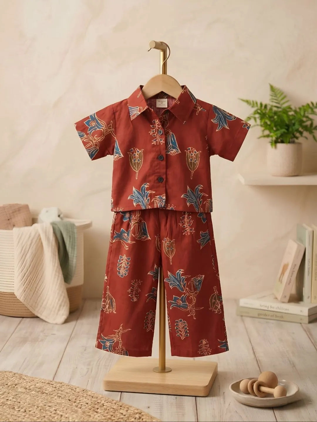 Kids rust printed shirt and pant set front look