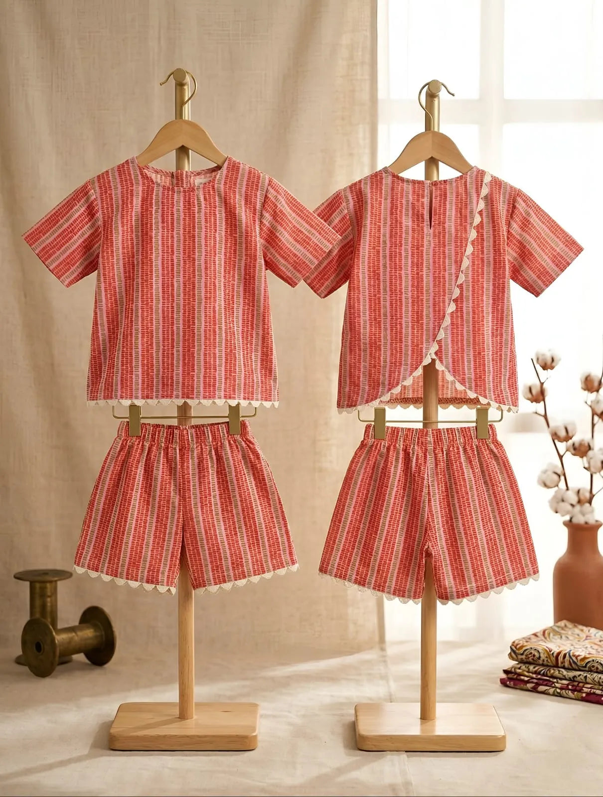Girls striped cotton co-ord set front and back view, lightweight summer outfit with crochet lace detailing and comfortable elastic shorts