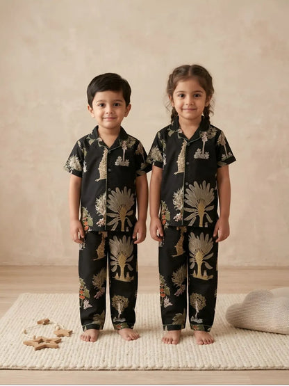 Kids black cotton nightsuit front view with printed shirt and pyjama set