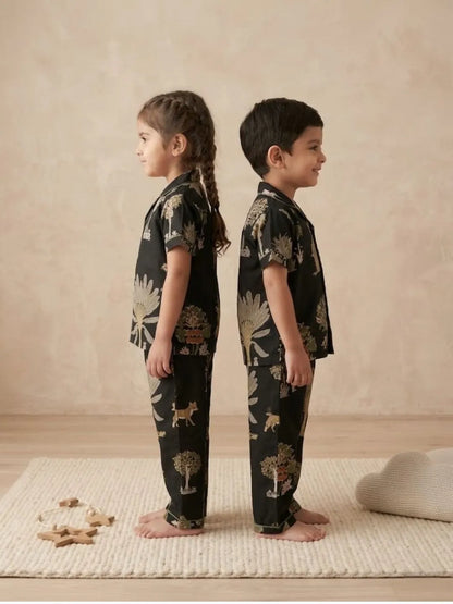 Side view of kids black printed nightsuit breathable cotton sleepwear
