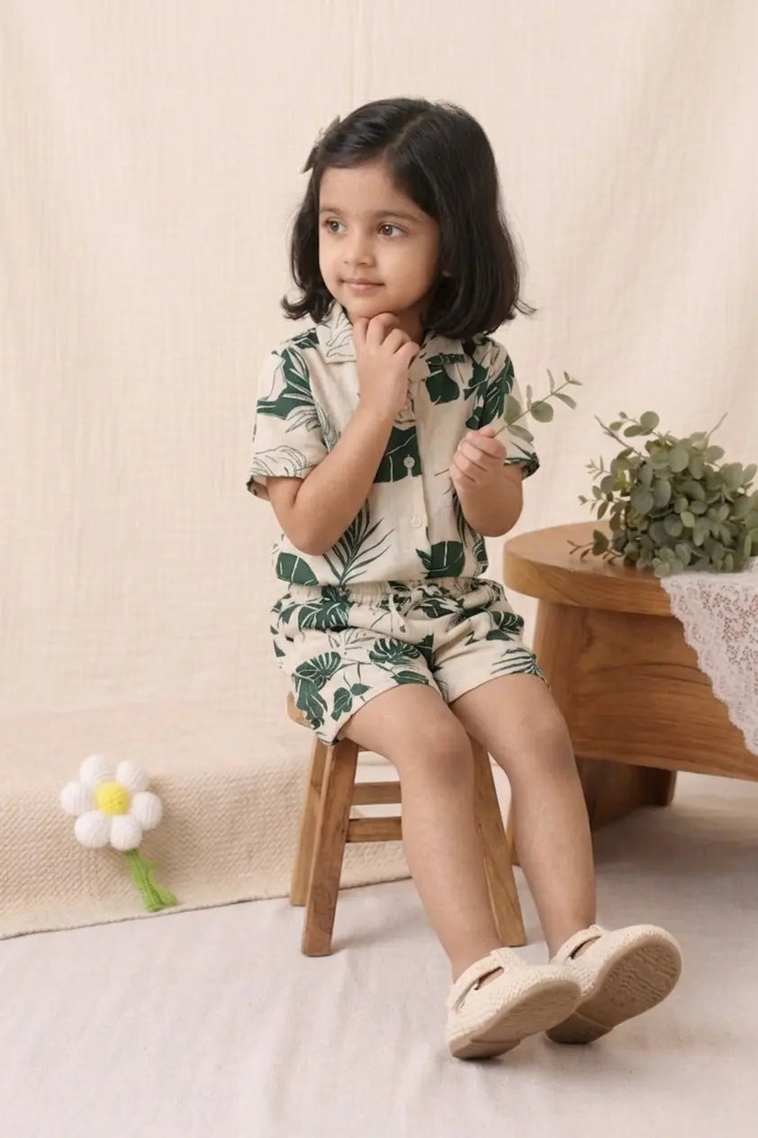 Little girl sitting in comfortable cotton co-ord set leaf print kids summer wear