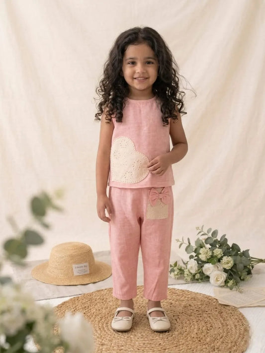 Girls pink cotton co-ord set with heart applique front view sleeveless top and pants