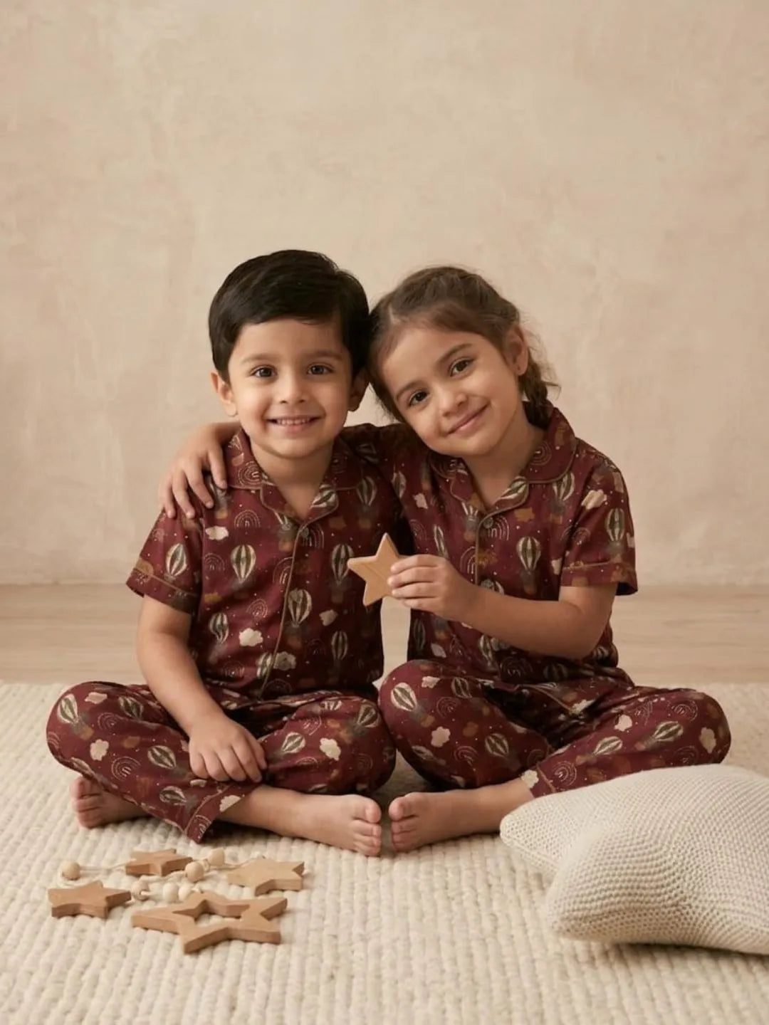 Kids red cotton nightsuit sitting pose soft breathable sleepwear