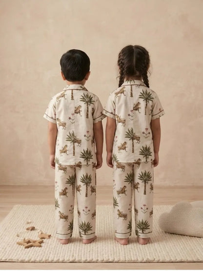 Back view of kids white printed nightsuit cotton pyjama set