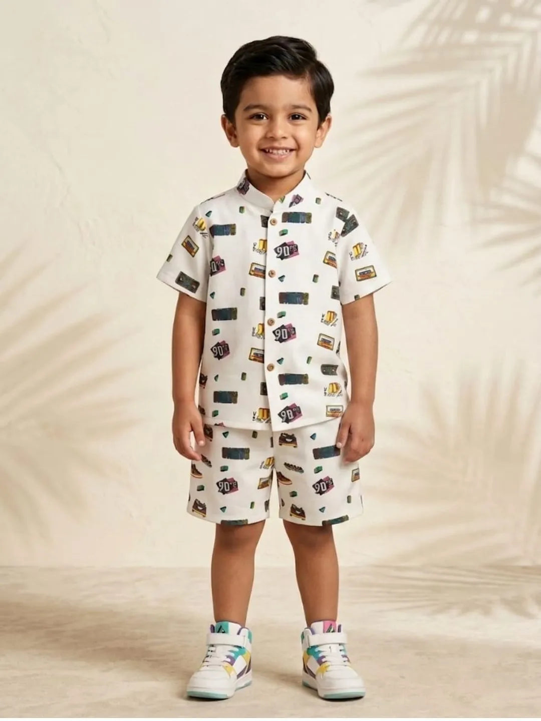 Boys white cotton co-ord set with retro print front view shirt and shorts