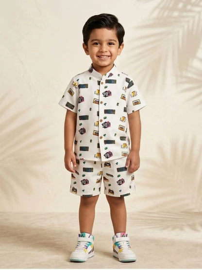 Boys white cotton co-ord set with retro print front view shirt and shorts