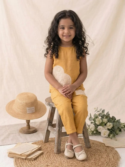Girls yellow heart applique co-ord set sitting pose kids summer cotton outfit