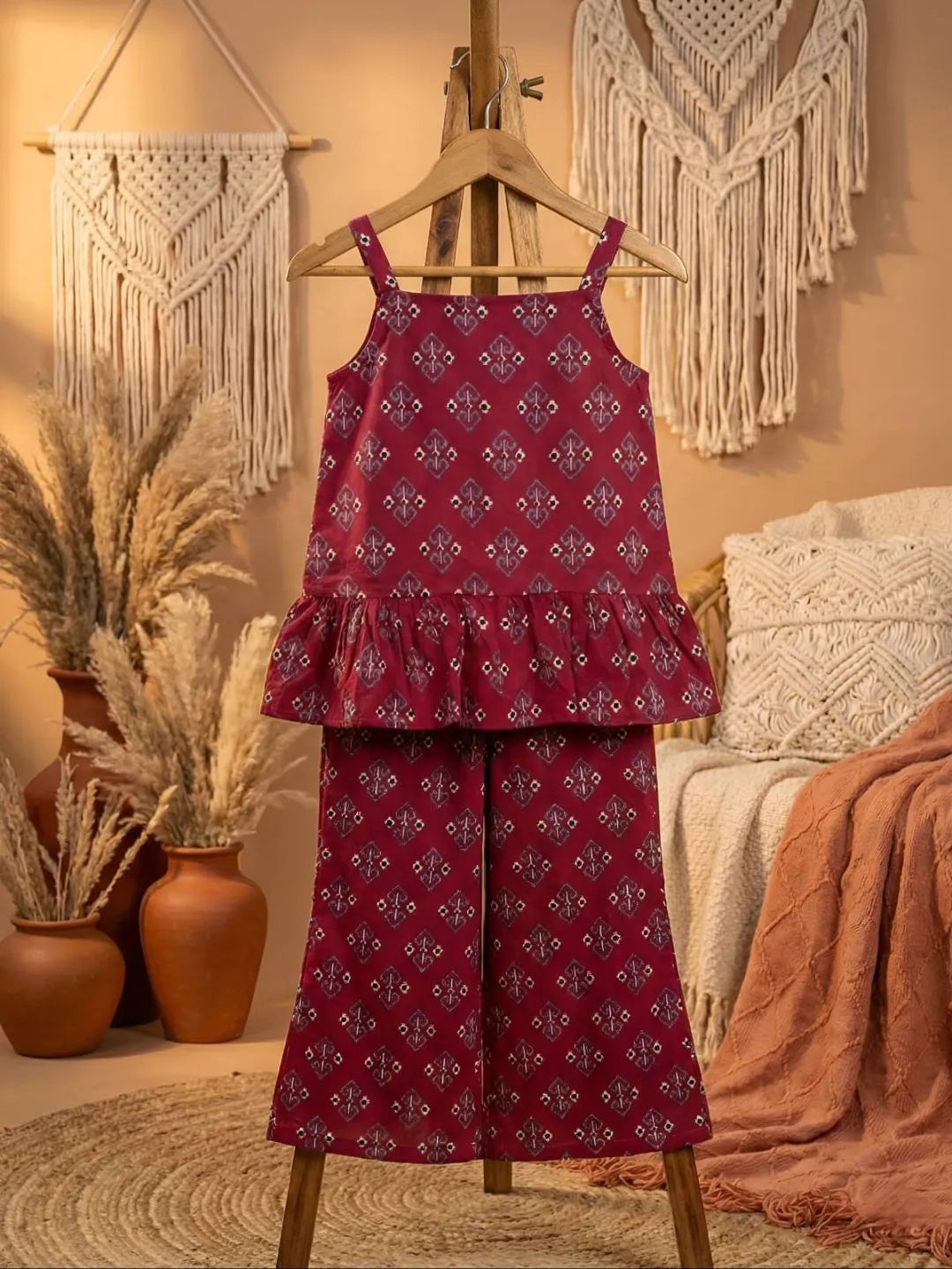 Kids red printed co-ord set front look with sleeveless top and wide leg pants